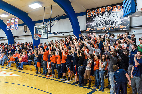 The student section assisting on free-throws