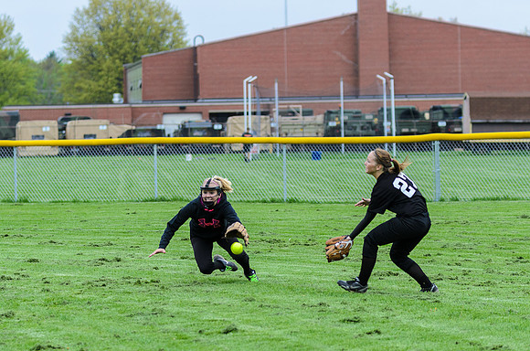 A fun series of photos of a ball that was right between the right fielder and center fielder