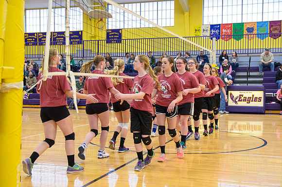 The girls greeting each other before the game
