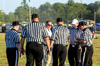 Coach Klein greeting the refs for the first time as head coach