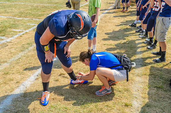 When you've got a knot in your shoes and it's hot, you get the trainer to help you out!