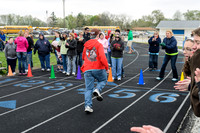 I think Travis finished first in his heat of the 25m dash. You can see some of the members of the National Honor Society cheering for the kids along the sidelines here too!
