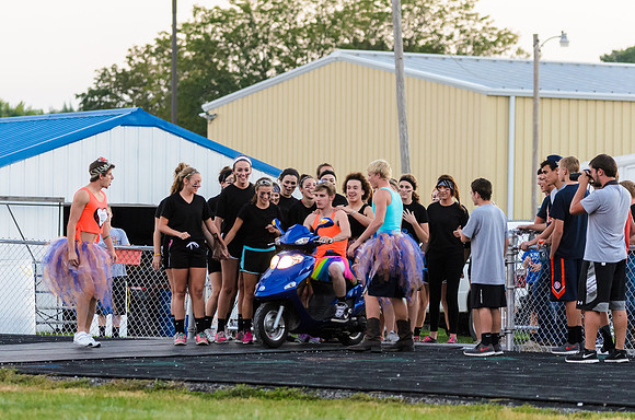 Complete with a motorcycle (aka scooter) to lead them on the field