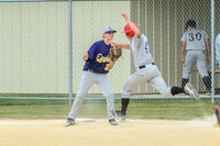 Unfortunately, the first baseman got plowed into--but he held onto the ball anyway!
