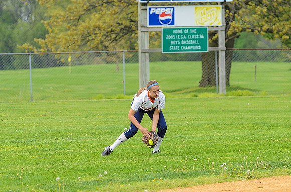 Addison fielding a hit to the outfield...