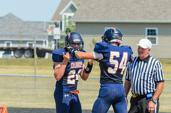Trying to get straps snapped back on after a penalty was issued