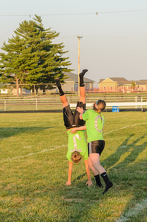 Doing a little gymnastics before the Powder Puff Football game on September 25, 2013