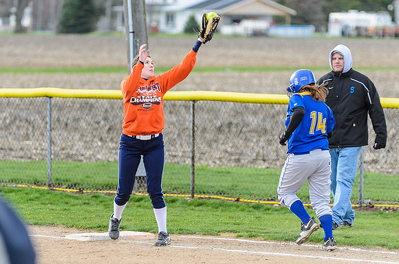 It isn't clear in this photo, but she's actually pulled off of the bag, so the runner ended up being safe