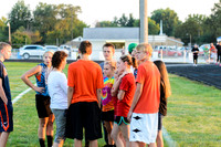 The Freshamn team getting a quick explanation on how to play football...